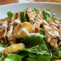Chicken Caesar · Romaine lettuce, parmesan, croutons with grilled chicken.