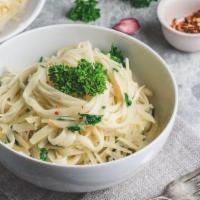 Garlic Olive Oil Linguini · Linguini style pasta topped with garlic olive oil. Served with Italian bread and butter.