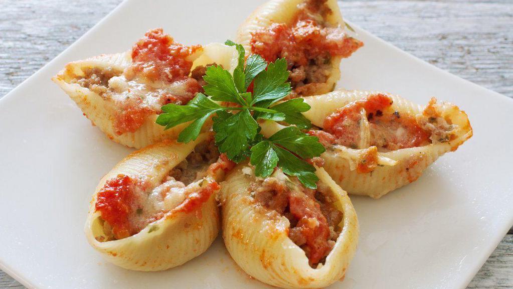 Stuffed Shells · Fresh warm marinara sauce, cottage cheese, mixed with pasta shells. Served with a side of Italian bread and butter.