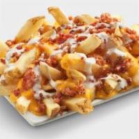 Ultimate Fries · Cheddar cheese sauce, bacon and ranch dressing.