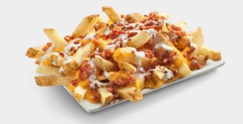 Ultimate Fries · Cheddar cheese sauce, bacon and ranch dressing.