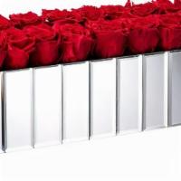 Large Modern Silver Mirrored Centerpiece · Modern silver vase with 18 Extra Large long-lasting roses.