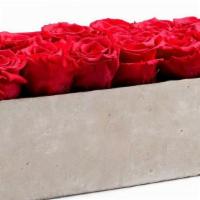 Custom Gray Slate Centerpiece · Gray slate box with 12 Extra Large long-lasting roses.