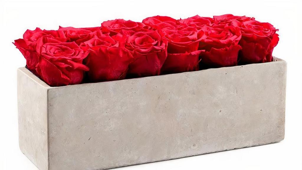 Custom Gray Slate Centerpiece · Gray slate box with 12 Extra Large long-lasting roses.