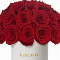 Ceramic Classic Half Ball Of 35 Roses · White ceramic vase with 35 Extra Large long-lasting roses.