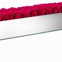 Custom Long Mirrored Centerpiece · Mirrored box with 22 to 24 Extra Large long-lasting roses. Comes in black, white, or silver ...