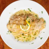 Flounder Francese · Fresh filet of flounder, sautéed with lemon and butter white wine dipped in egg batter.