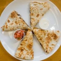 Carne Enchilada Quesadilla · 10'' flour tortilla with Monterrey Jack cheese, spicy pork and cooked onions. Includes side ...