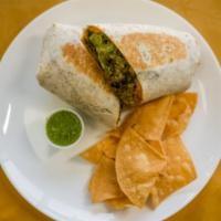 Bistec A La Parilla Burrito · Grilled steak. A staple in Mexican cuisine. Consists of a flour tortilla rolled up and fille...
