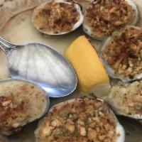 Baked Clams · Baked little neck clams with white wine.