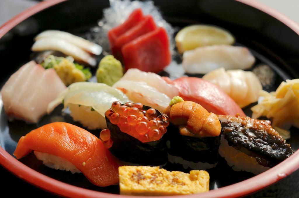 Sushi & Sashimi Combination · served with miso soup. SUSHI: fatty bluefin, salmon, white fish, spot shrimp sea urchin, salmon roe, eel, egg omlette. SASHIMI: bluefin, white fish, silverfish, octopus and sea scallop.