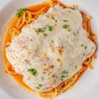 Chicken Parmesan · fresh mozzarella, pomodoro, fettuccine.