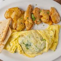 Omelette · Bacon, goat cheese, caramelized onion, spinach.