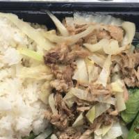 Kalua Pulled Pork Mini Bento · Pork and cabbage with a smoky taste. Includes steamed white rice