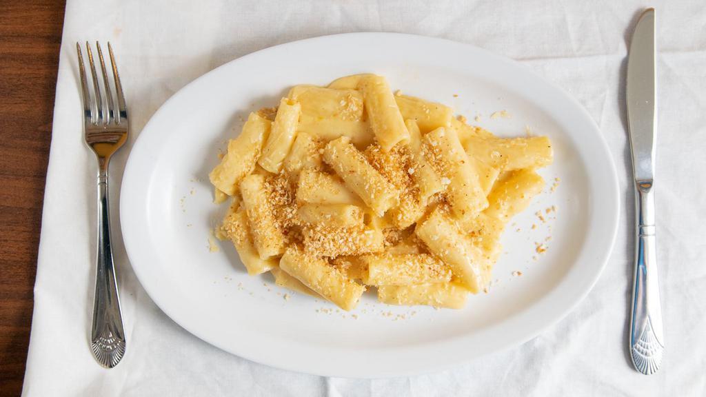 Italian Mac & Cheese · Mac and Cheese with a gourmet proprietary cheese blend and topped off with toasted bread crumb.
