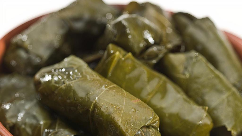 Stuffed Grape Leaves · Two pieces. Stuffed grape leaves with rice.