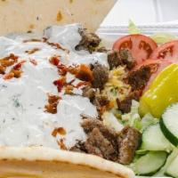 Lamb Over Rice Platter · Favorite. Staten island famous lamb gyro meat over rice with salad on the side. Tzatziki sau...