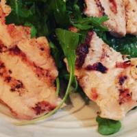 Chicken Salad · Grilled chicken breast over greens, light balsamic vinaigrette.
