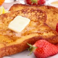 Strawberry French Toast · Classic French Toast cooked to perfection, topped with fresh Strawberries.