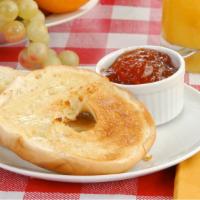 Toasted Bagel With Butter And Jelly · Customer's choice of Bagel with a side of butter and jelly.