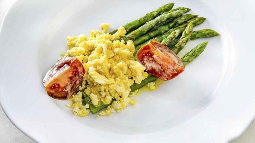 Asparagi Freddi* · traditional Sant Ambroeus steamed asparagus, tomato, hard-boiled egg, rainbow microgreens.  *Consuming raw or undercooked meats, poultry, seafood, shellfish or eggs may increase your risk of foodborne illness