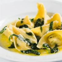 Ravioli Della Casa · handcrafted spinach and ricotta ravioli, sage, Parmigiano-Reggiano