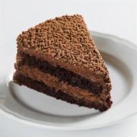 Dolce Sant Ambroeus · light chocolate mousse cake with layers of moist chocolate almond sponge, soaked with a ligh...