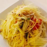 Papaya Salad · Shredded green papaya with tomato, green bean, ground peanut and dried shrimp in spicy lime ...