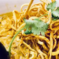 Khao Soi · Northern Thai curry with (your choice below) served with egg noodle and a side of bean sprou...