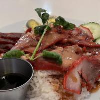 Khao Moo Daeng · BBQ Pork, Chinese sausage and boiled egg served over steamed rice topped with cilantro, cucu...