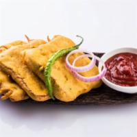 Amritsari Fish Pakora · Fresh catch marinated with north Indian spices pan fried in Dhaba style.