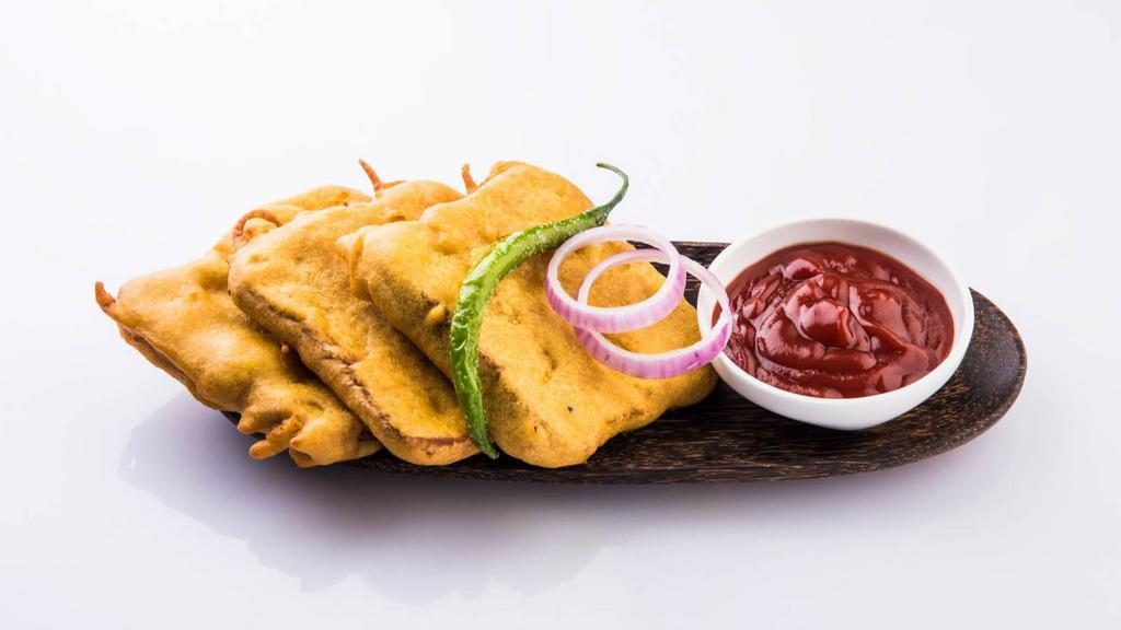 Amritsari Fish Pakora · Fresh catch marinated with north Indian spices pan fried in Dhaba style.
