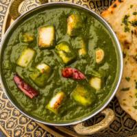 Palak Paneer · Fresh baby spinach sautéed with garlic, ginger & cottage cheese in cream sauce.