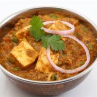 Khoya Kaju · Shredded paneer with kaju and khoya sauce.