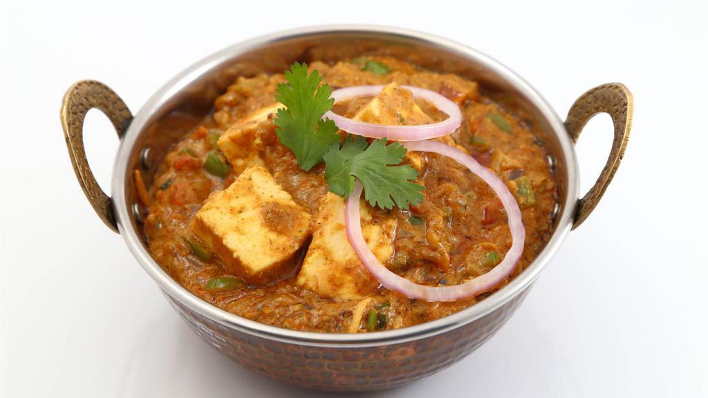 Khoya Kaju · Shredded paneer with kaju and khoya sauce.