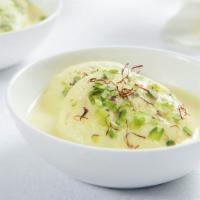Rasmalai · Delicious sweet cottage cheese dumplings flavored with saffron and cardamom.