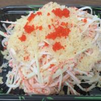 Kani Salad · Crab meat, cucumber, tobiko and mayo crunch.