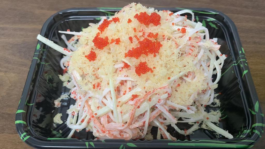 Kani Salad · Crab meat, cucumber, tobiko and mayo crunch.