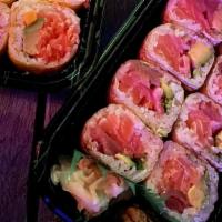 Madison Roll · Spicy salmon crunch, mango and avocado wrapped in soy paper.