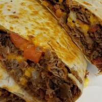 Steak Quesadilla · Served with steak, cheese and tomatoes. Includes salsa and sour cream on the side.