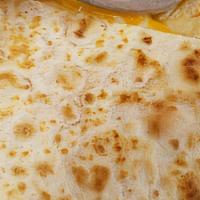 Cheese Quesadilla · Includes salsa and sour cream on the side.