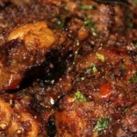 Pepper Chicken · A boneless breast of chicken seasoned with spicy blend of peppers and masalas.
