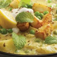 Navrathan Korma · Combination of vegetables cooked in mild creamy almond and cashew nut sauce.