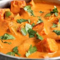 Paneer Tikka Masala · Homemade cheese cooked in a creamy sauce with mild spices.