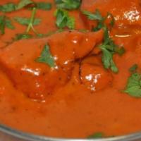 Chicken Tikka Masala · Boneless chicken breast cooked in a creamy sauce and spices.