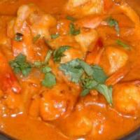 Shrimp Curry · Fresh shrimp cooked in lightly spiced coconut milk.
