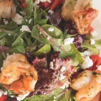 Pan Seared Shrimp · Served over baby field greens, goat cheese cranberry & champagne vinaigrette.