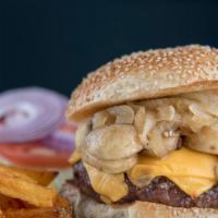 Landmark Gourmet Burger · 100 % prime beef burger, Swiss or cheddar cheese sautéed caramelized onions & mushrooms.