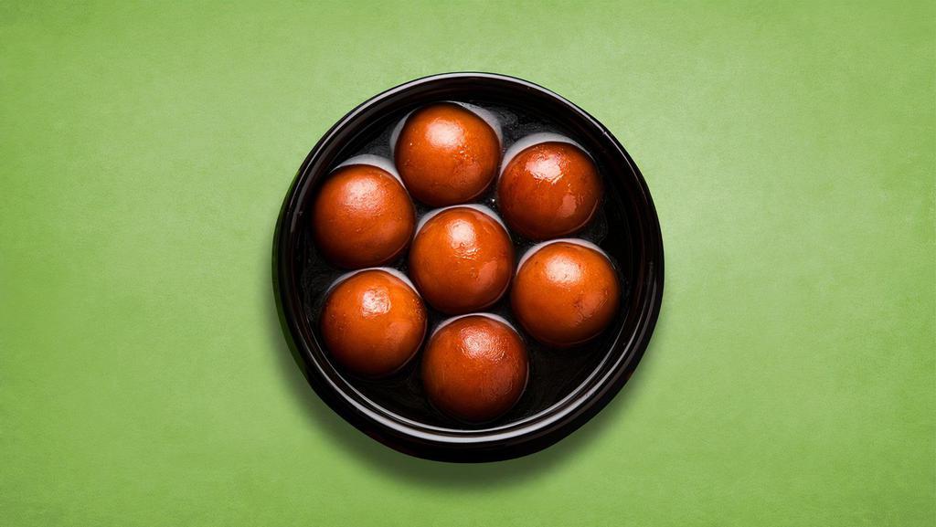 Divine Dumpling Discovery · Soft delicious berry-sized balls made of milk solids, flour & a leavening agent.
