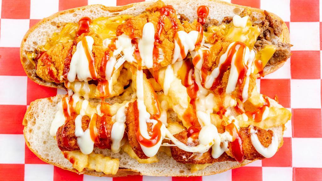Fat Yankee Sandwich · Cheesesteak, chicken tenders, mozzarella sticks, fries, mayonnaise, and ketchup.